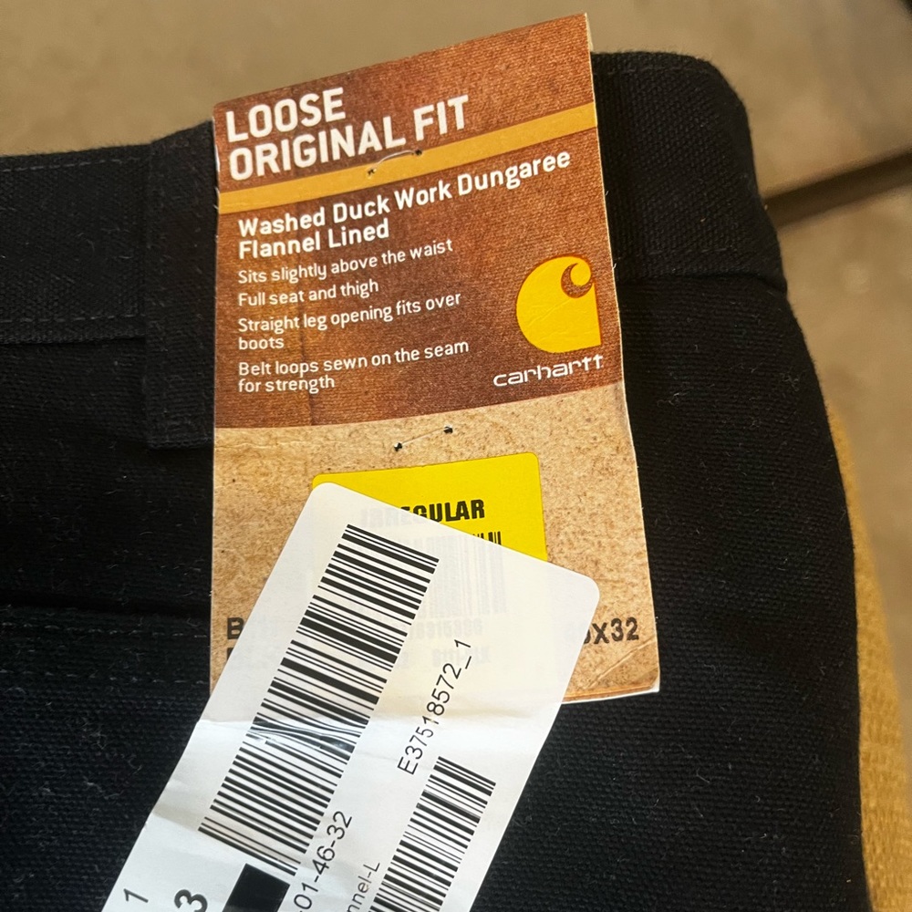 Brand new 46 x 32 Carhartt men’s black pants .